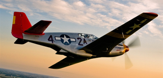 A restored North American P-51C Mustang in the markings of the 99th Pursuit Squadron